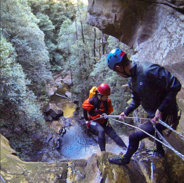 Repelling a waterfall blue mountains