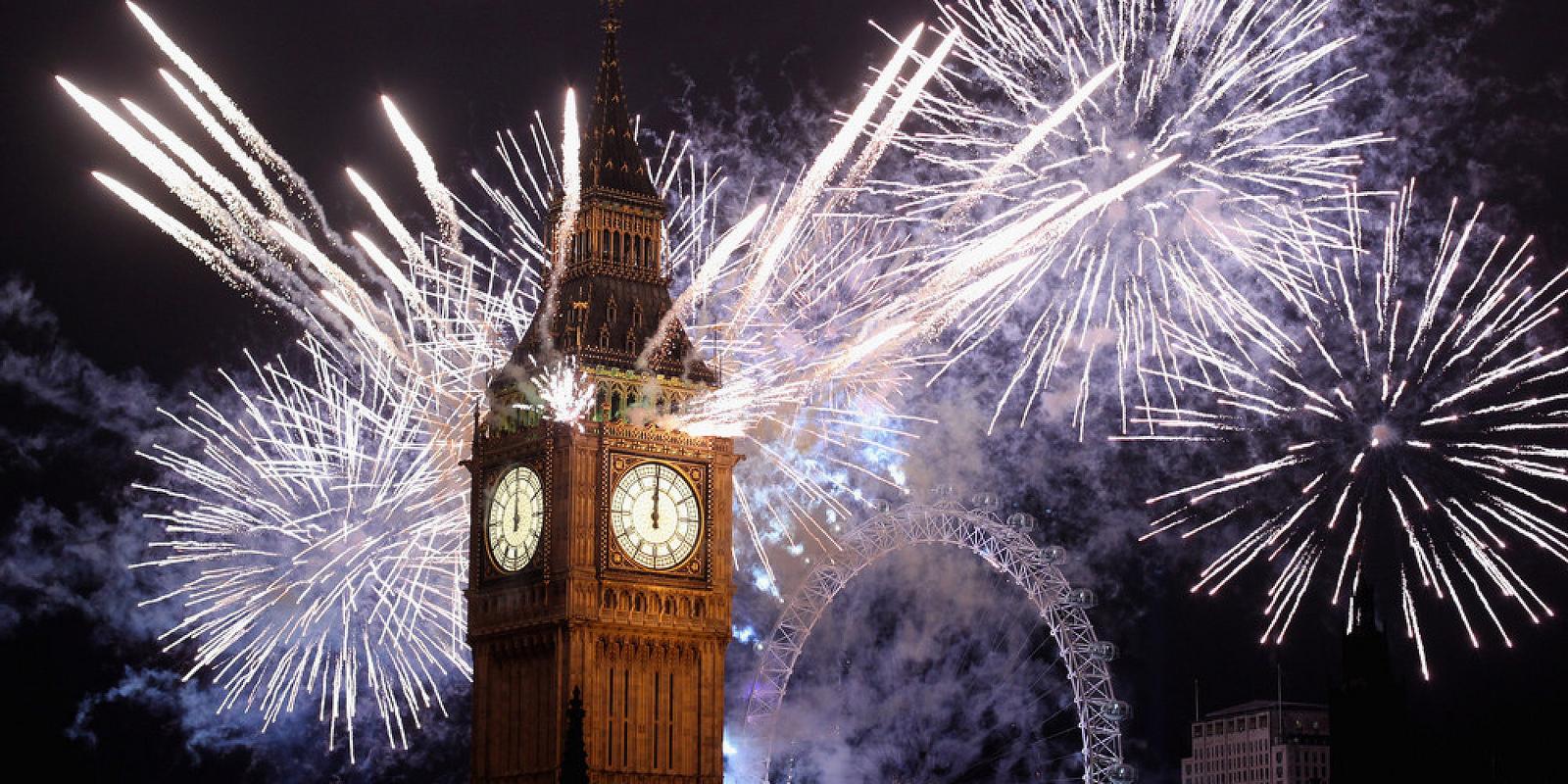 Big Ben chimes in New Year's Fireworks London 