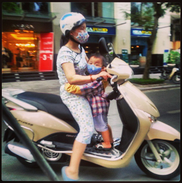 kids on motorbikes vietnam