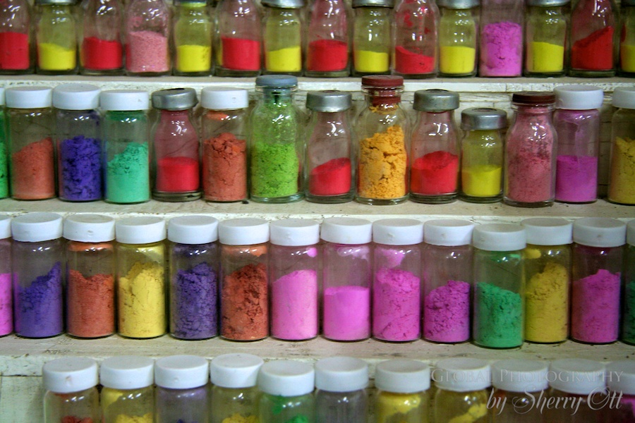 colorful powders adorn the shelves of Fez Morocco