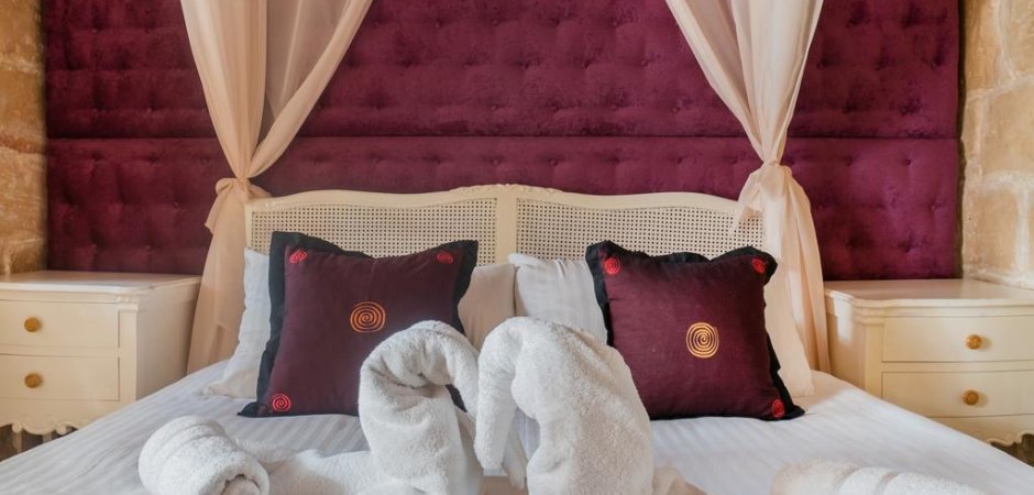 The Violet room at the Chapel 5 Suites in Naxxar.